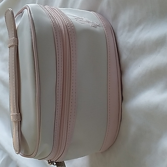 Lancome Handbags - Lancome white and pink Cosmetic Bag